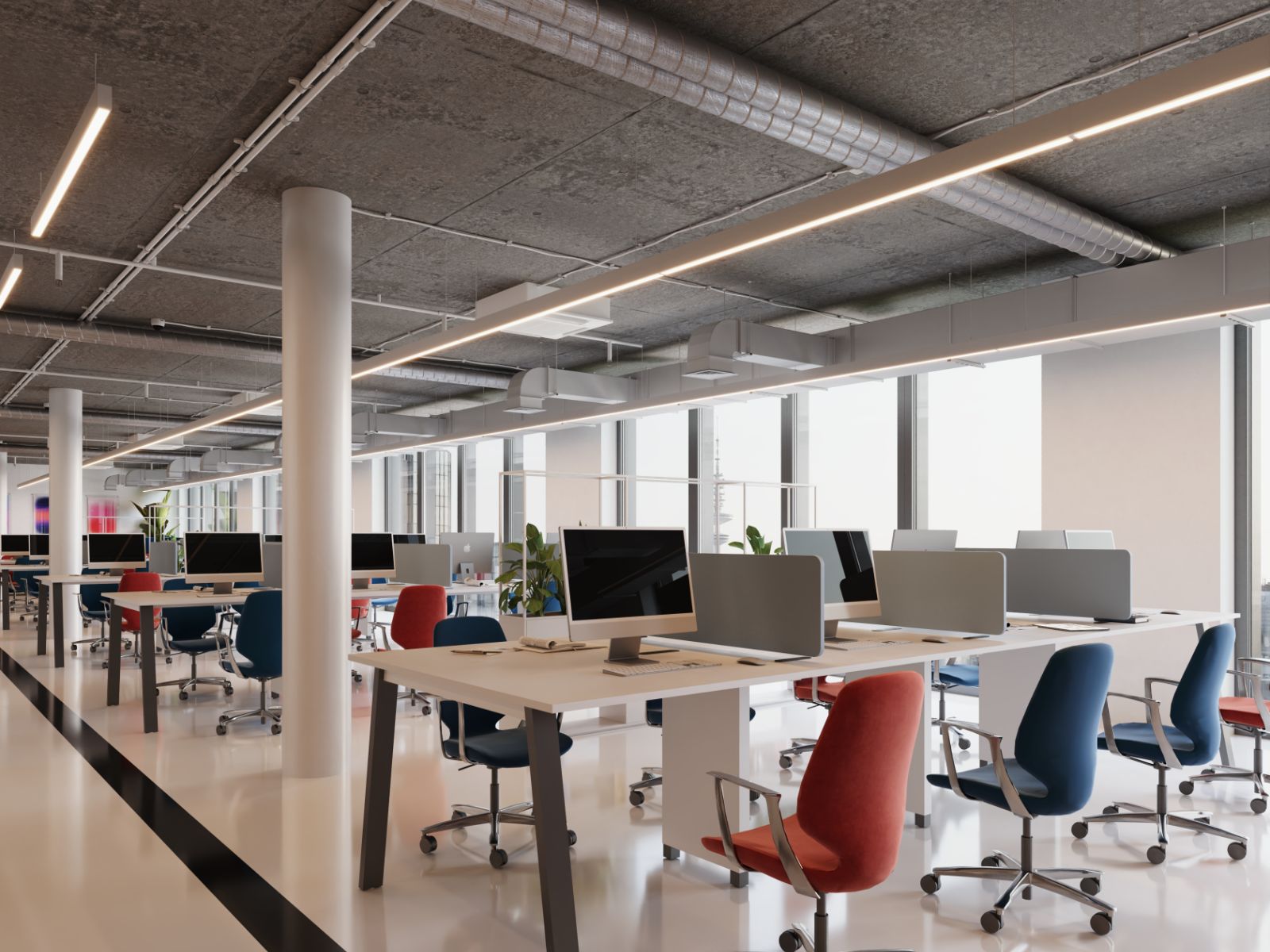 An open-plan office floor with desking